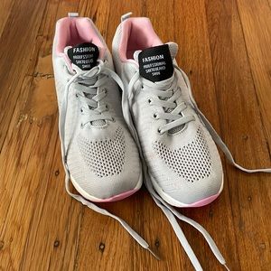 Gray and pink running shoes